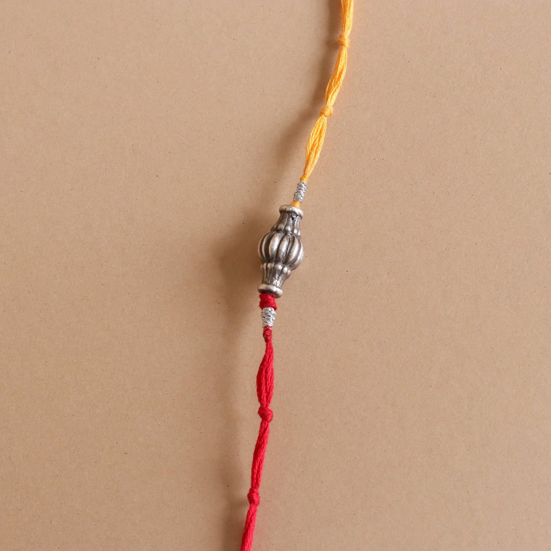 Sliver Ovol Beads Rakhi-1